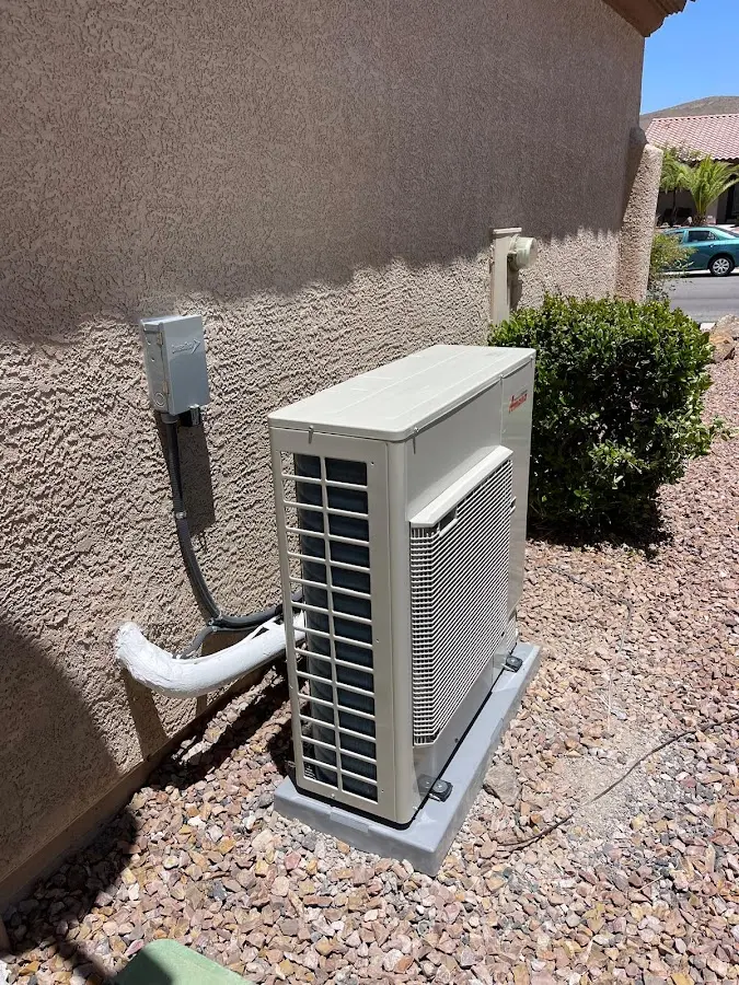 Residential air conditioning condenser unit in Jeannette
